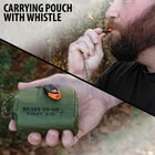 Full image showing the carrying pouch and whistle that comes with the Green Emergency Sleeping Bag.